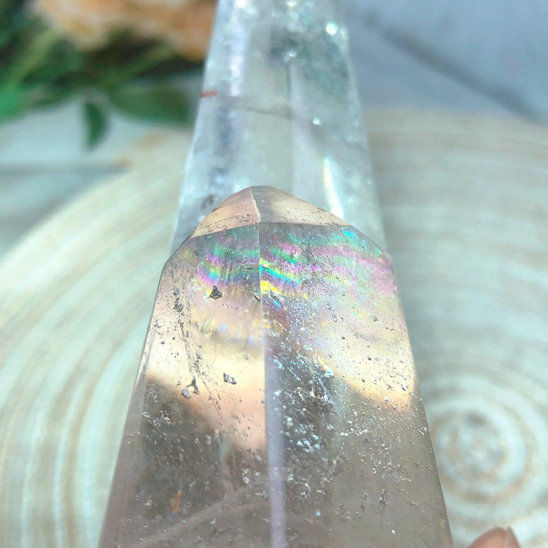 Clear Quartz double mountain tower with iridescent rainbow flashes, a natural healing crystal.