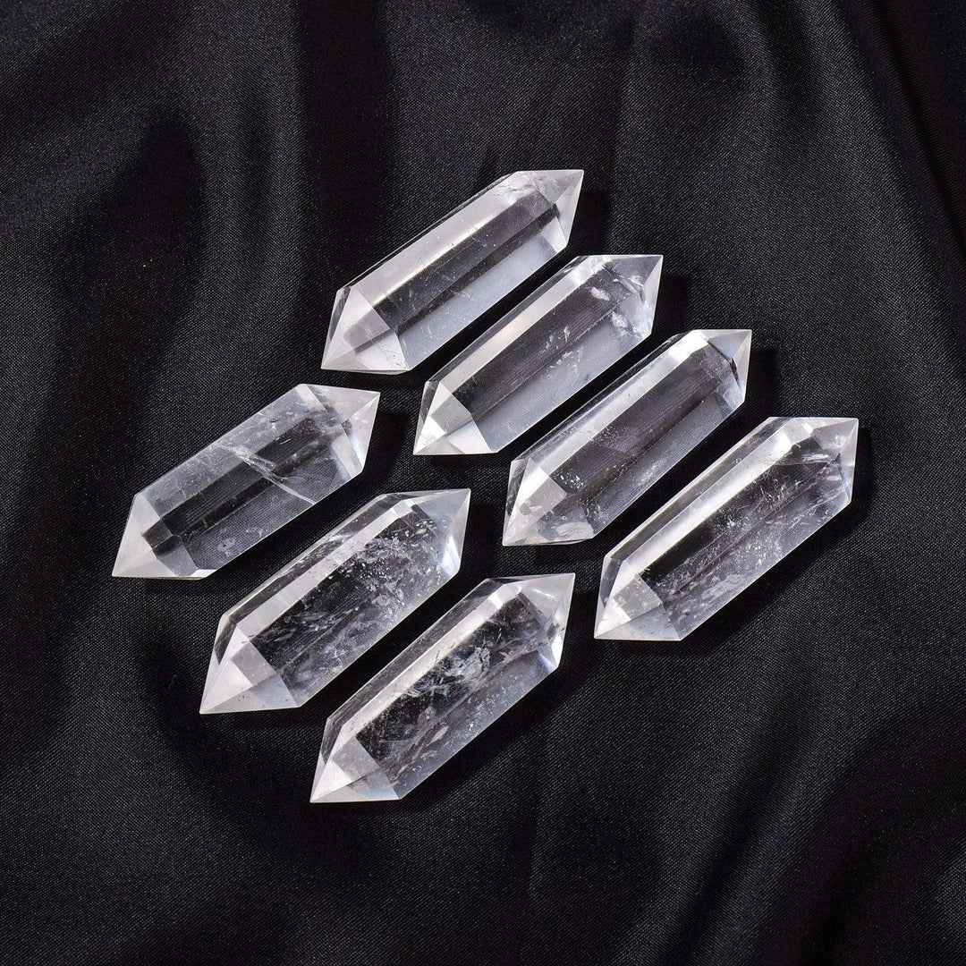 Clear Quartz Crystal Double Terminated Points, radiating clarity and amplification, perfect for manifestation and healing.