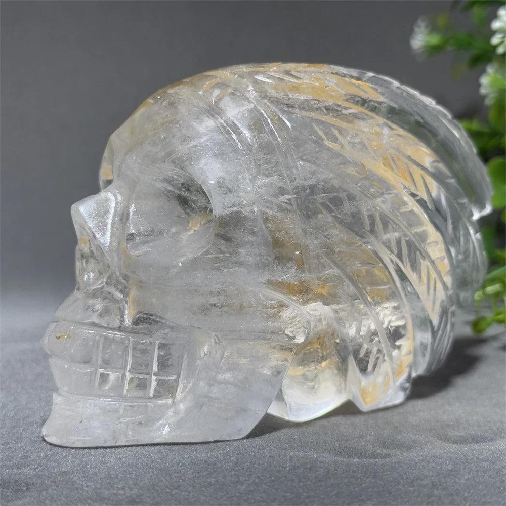 Hand-carved clear quartz crystal skull with intricate details, perfect for Crown Chakra reflection and altar decor.