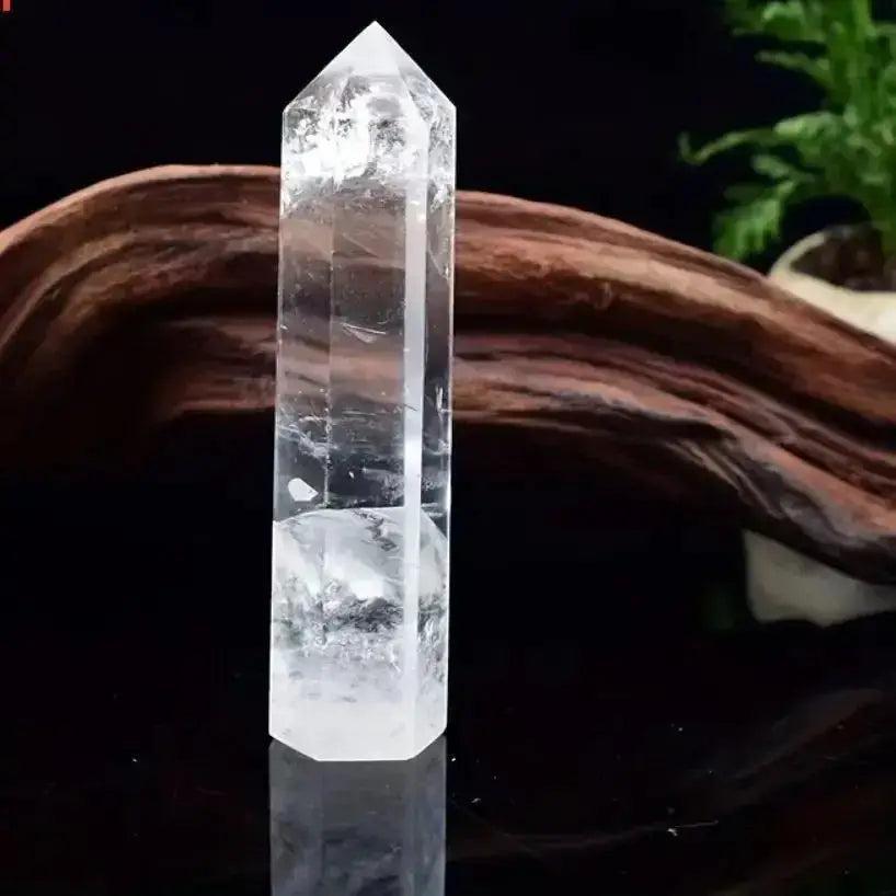 Clear Quartz Hexagonal Crystal Tower, a polished natural crystal obelisk, amplifies energy and promotes clarity.