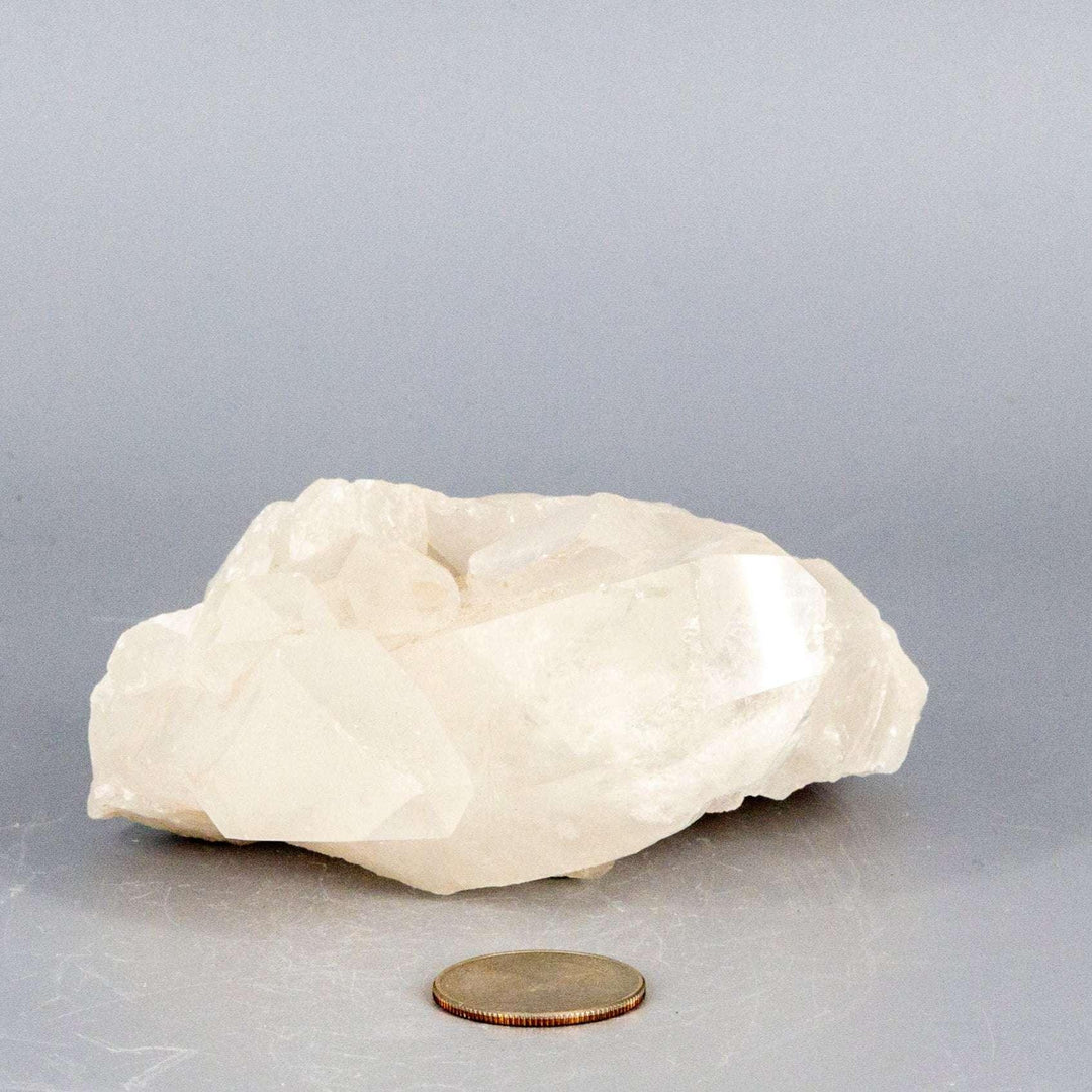 Clear Quartz Crystal Point Cluster Raw Natural Stone, a broad, low-profile cluster with multiple terminated points.