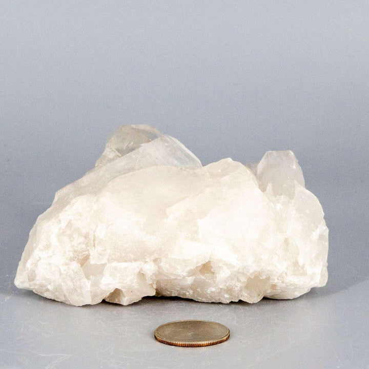 Clear Quartz Crystal Point Cluster Raw Natural Stone, a broad, low-profile cluster with multiple terminated points.