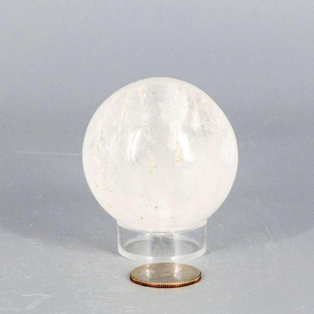 Natural Quartz Sphere Master Healer, 53-55mm, clear polished crystal with unique inclusions, radiating amplifying energy.