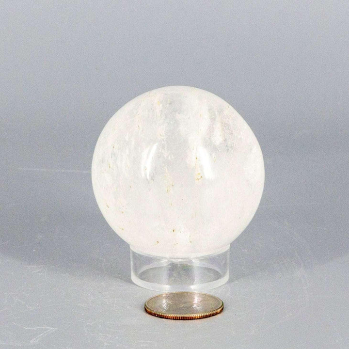 Natural Quartz Sphere Master Healer, 53-55mm, clear polished crystal with unique inclusions, radiating amplifying energy.