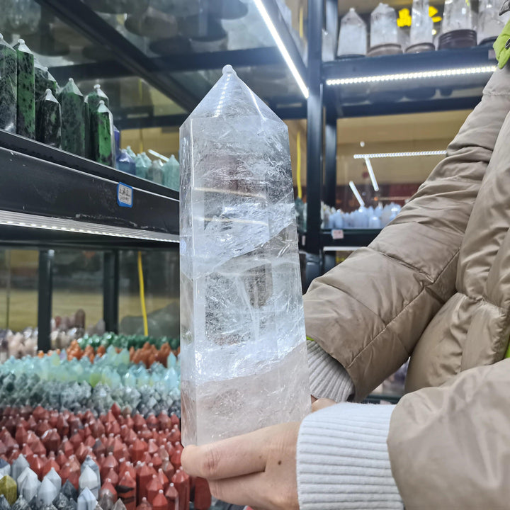 Substantial, polished Clear Quartz Crystal Tower Obelisk, radiating clarity and amplifying intentions for healing and manifestation.