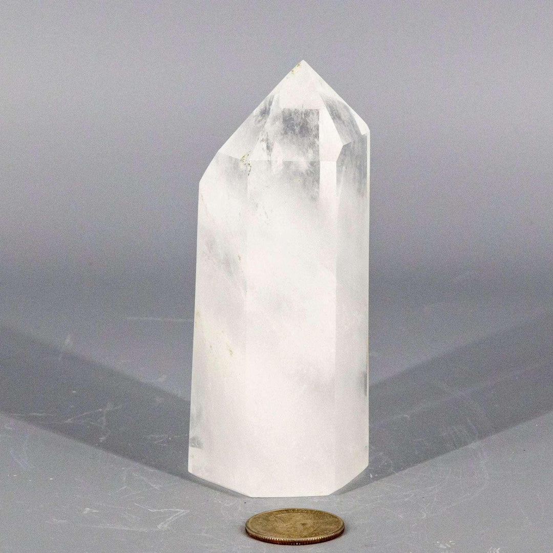 Polished Clear Quartz Crystal Tower, 114mm tall, amplifying Crown Chakra energy with its natural point.