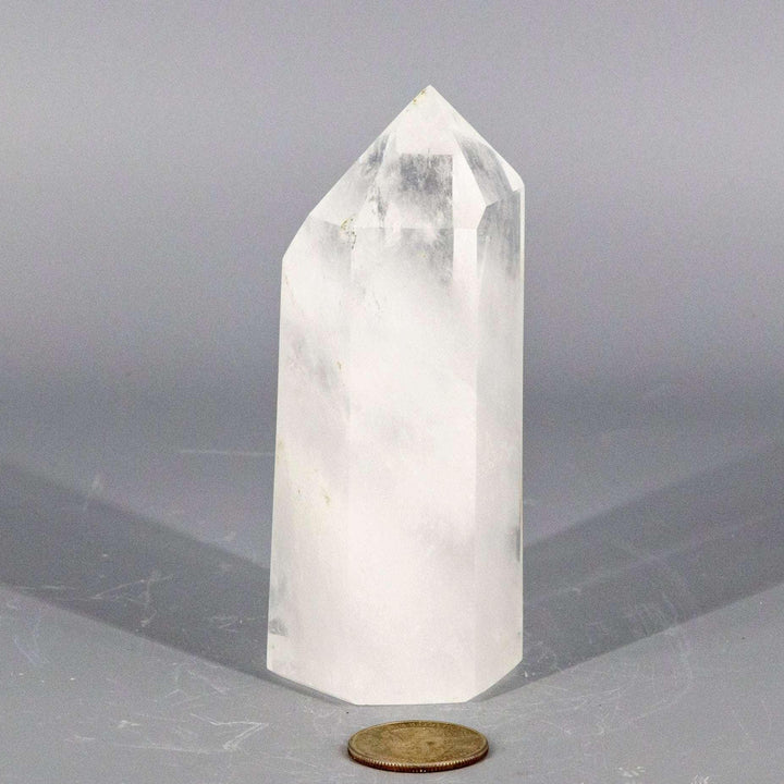 Polished Clear Quartz Crystal Tower, 114mm tall, amplifying Crown Chakra energy with its natural point.