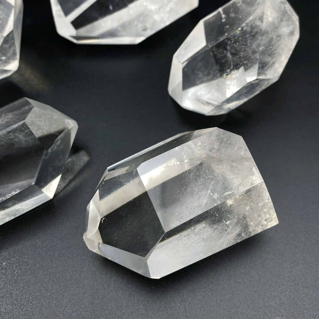 Natural clear quartz freeform crystal with a polished, transparent finish, perfect for healing and spiritual energy.