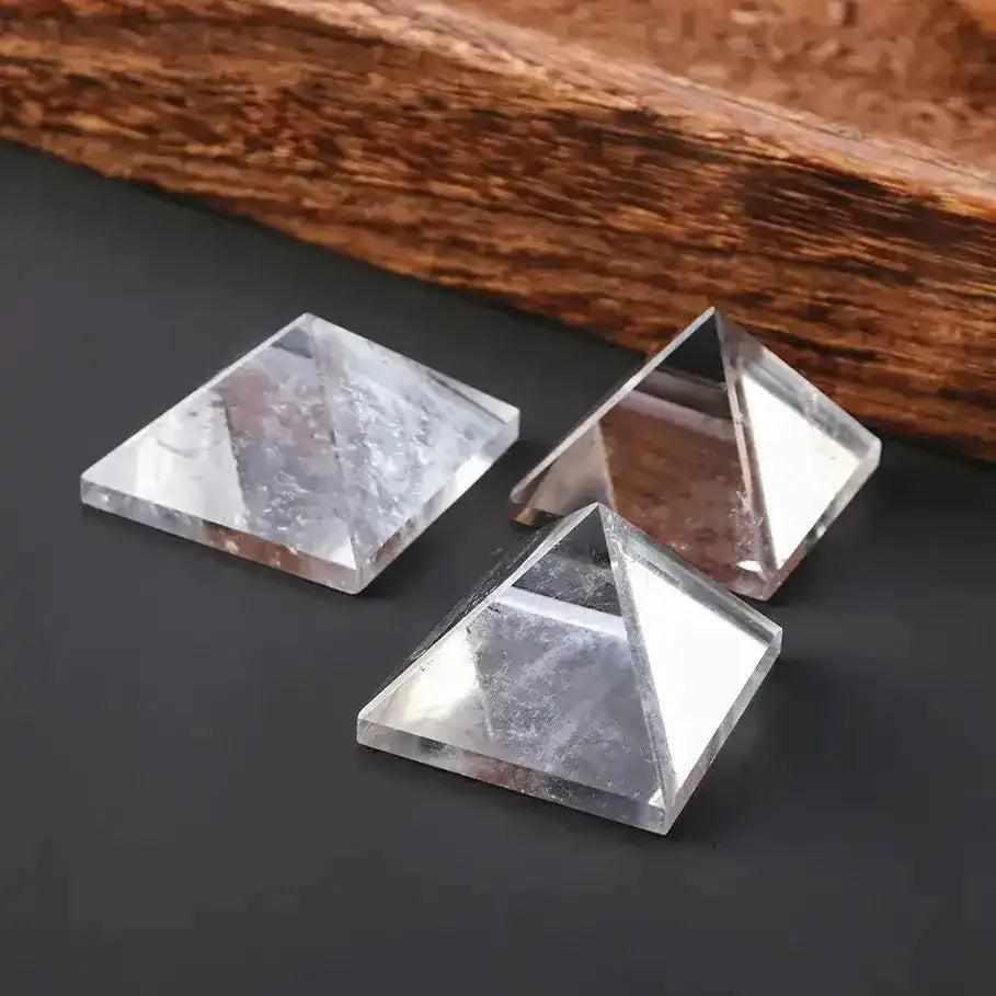 Clear Quartz Mini Pyramids with natural veils, hand-polished for clarity to amplify intention and focus energy.