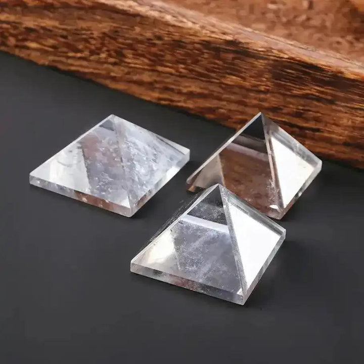 Clear Quartz Mini Pyramids with natural veils, hand-polished for clarity to amplify intention and focus energy.