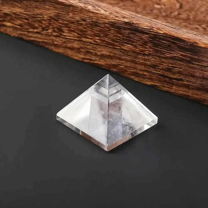 Clear Quartz Mini Pyramid with natural veils, hand-polished into a sacred geometry shape for clarity and intention.