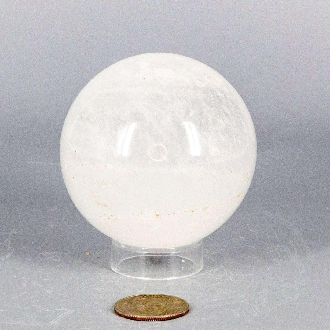 Clear Quartz Sphere 67mm: Substantial, holdable, radiating energy. Natural inclusions add depth and character.