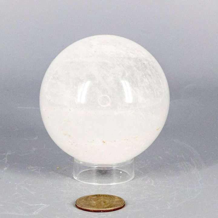 Clear Quartz Sphere 67mm: Substantial, holdable, radiating energy. Natural inclusions add depth and character.