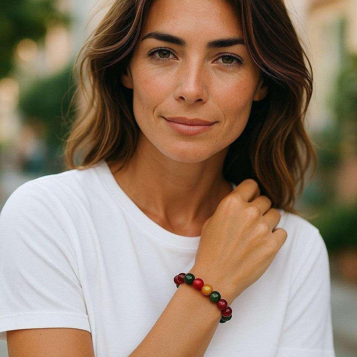 Woman wearing a Colorful Agate Beaded Bracelet with vibrant 8mm polished beads, showcasing natural beauty and grounding energy.