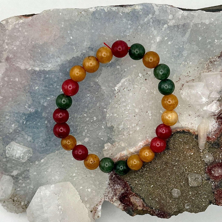 Vibrant Colorful Agate Beaded Bracelet with 8mm polished beads, displaying natural red, orange, and green tones.