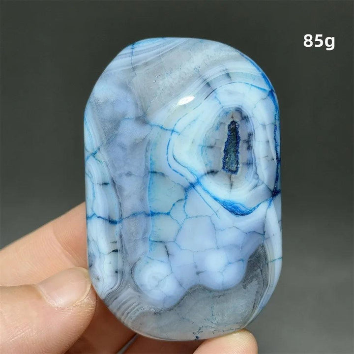 85g blue dragon pattern agate palm stone, a polished natural crystal for healing, meditation, and Feng Shui decor.