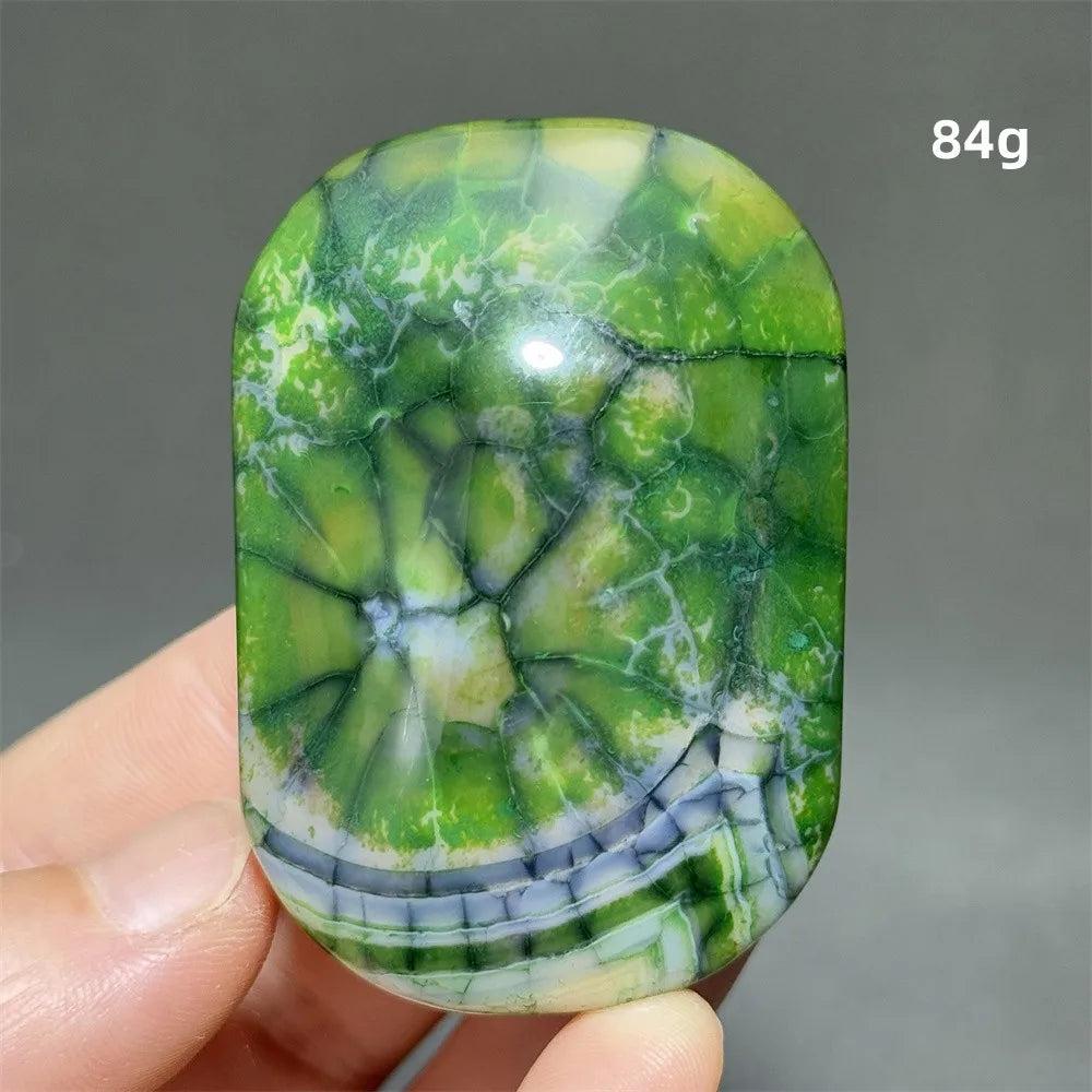 Polished green dragon pattern agate palm stone, 84g natural healing crystal for meditation and Feng Shui decor.