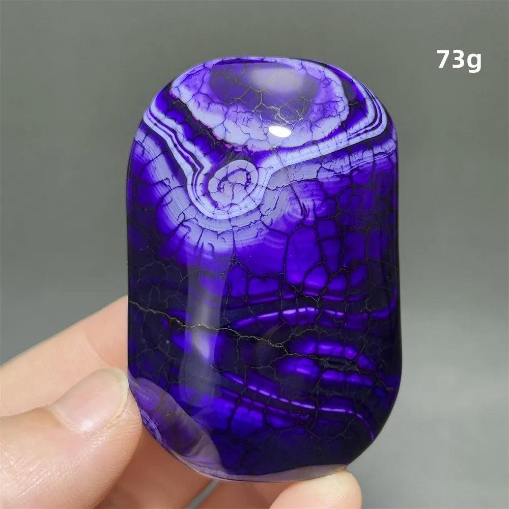Polished 73g purple dragon pattern agate palm stone for healing, meditation, and beautiful home decor.