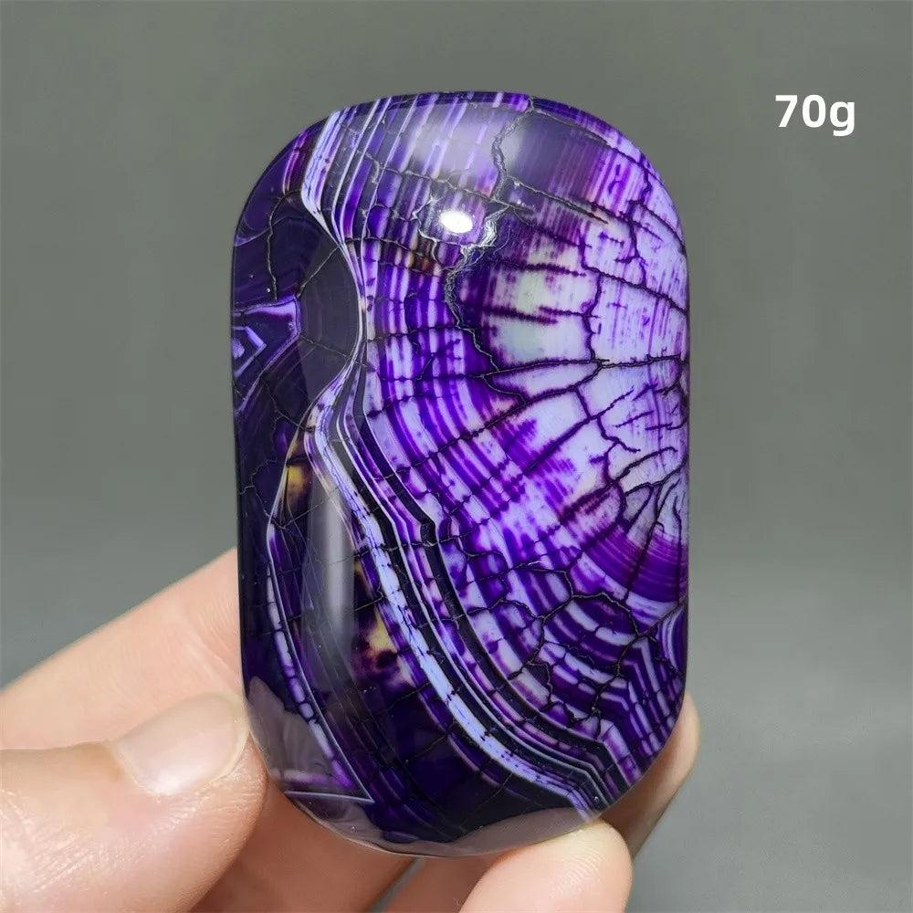 70g purple dragon pattern agate palm stone, a polished natural crystal for healing, meditation, and feng shui decor.