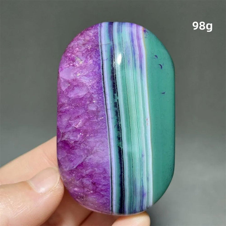 Colorful 98g dragon pattern agate palm stone with vibrant purple and green banded crystal for healing and meditation.