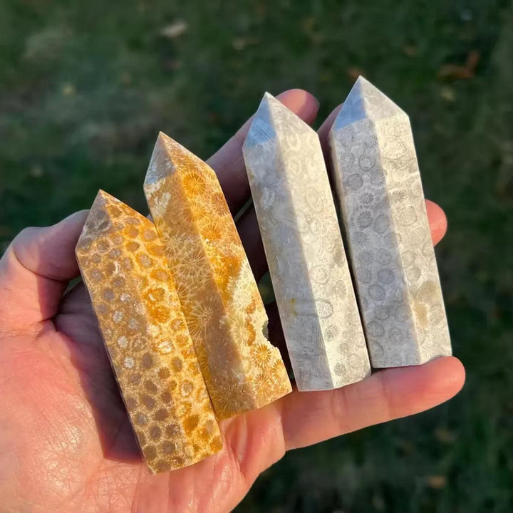 Yellow and white Coral Jade Pillar Towers with fossilized patterns for healing energy.