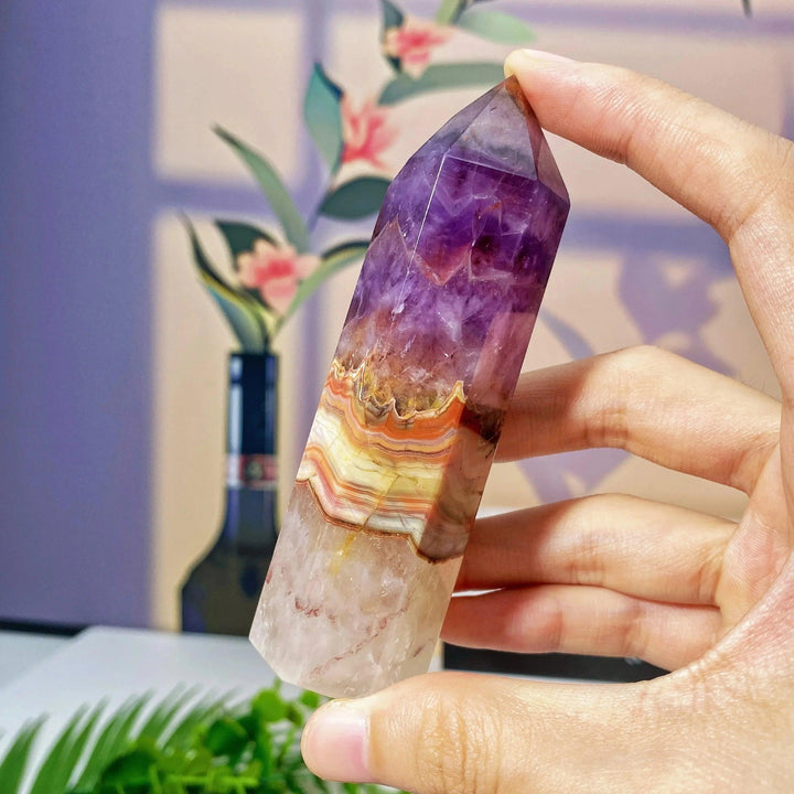 Vibrant Natural Amethyst Lace Agate Tower, a stunning blend of purple, orange, and white for exceptional home decor.