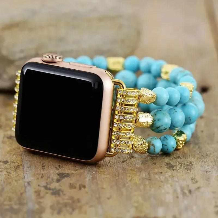 Crystal Beaded Apple Watch Band with vibrant turquoise Howlite beads and gold accents for peace and tranquility.