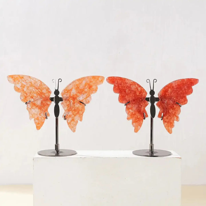 Crystal Carved Butterfly in vibrant orange and red stone on a metal stand, perfect for mindful decor and energy healing.
