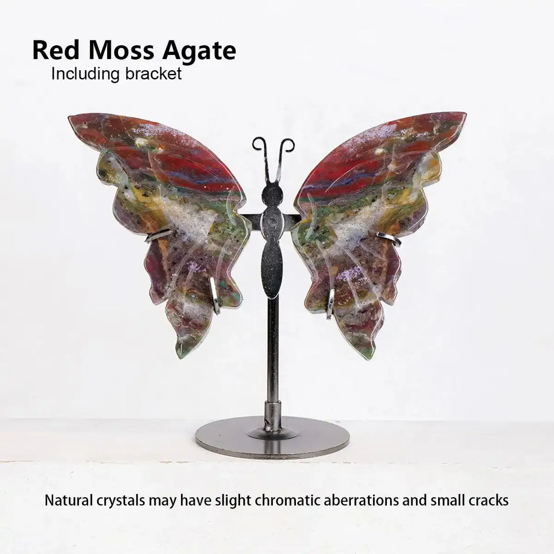 Red Moss Agate crystal carved butterfly on a metal stand, featuring vibrant red and green patterns for grounding energy.