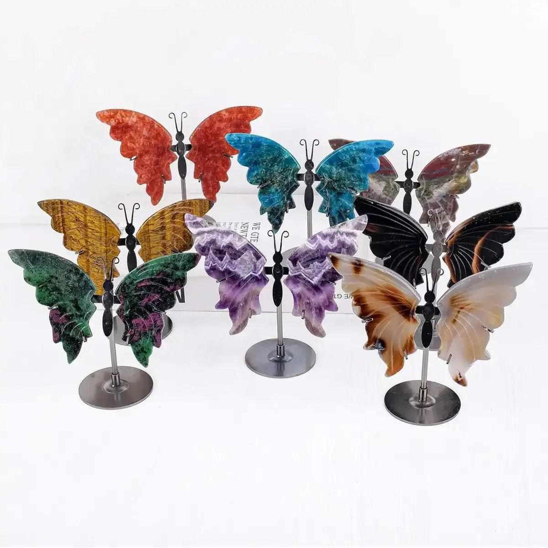 Crystal Carved Butterfly collection in assorted gemstones, featuring elegant wings on metal stands for mindful decor.