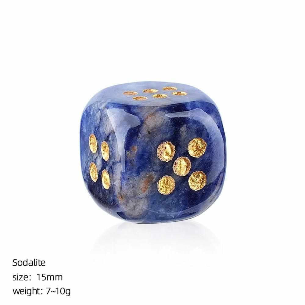 15mm Sodalite crystal dice with rounded corners and gold pips, offering calming energy in a polished stone cube.