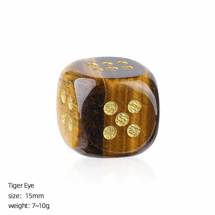 15mm Tiger Eye crystal carved die with rounded corners and gold-etched pips for grounding energy and elegant gameplay.