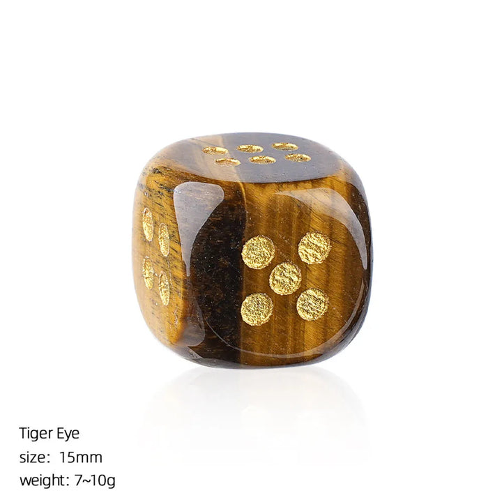 15mm Tiger Eye crystal carved die with rounded corners and gold-etched pips for grounding energy and elegant gameplay.