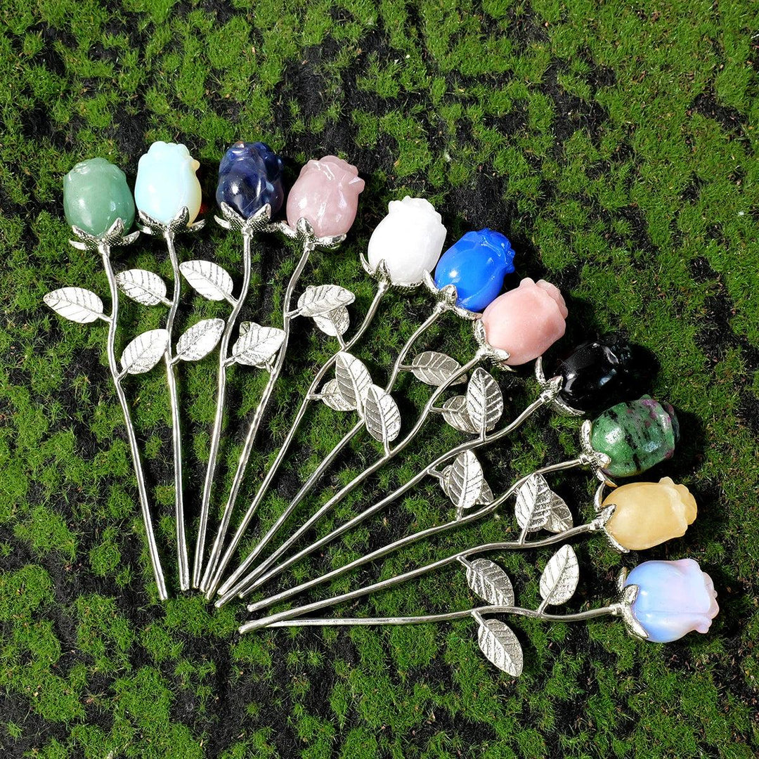 Hand-carved crystal rose flowers in 11 natural gemstones with silver stems, perfect for meditation and altar decor.