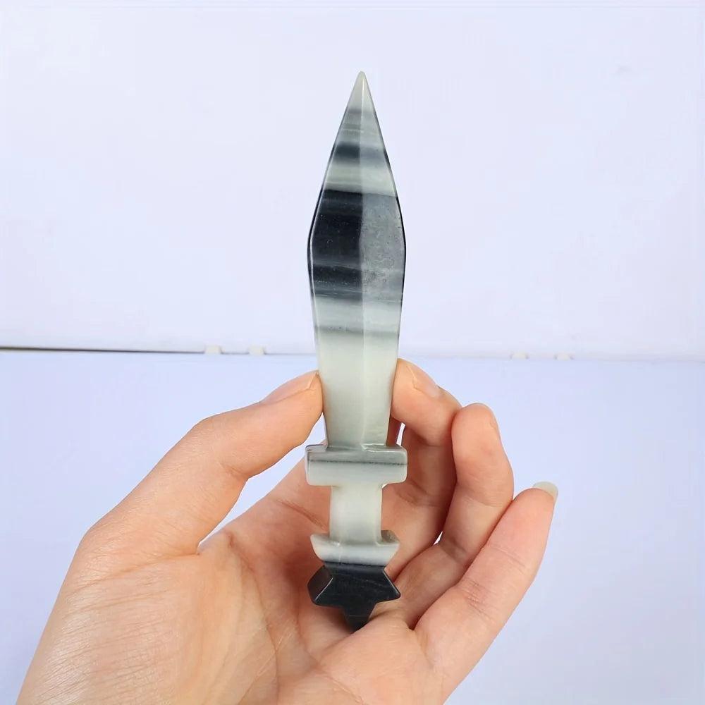 Hand-carved Tai Chi Stone Crystal Carved Sword Letter Opener, displaying striking black and white layers.