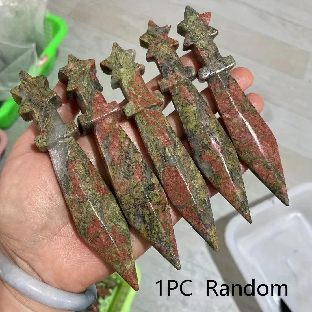 Hand-carved Unakite crystal sword letter openers, featuring grounding green and red hues, for energy work.