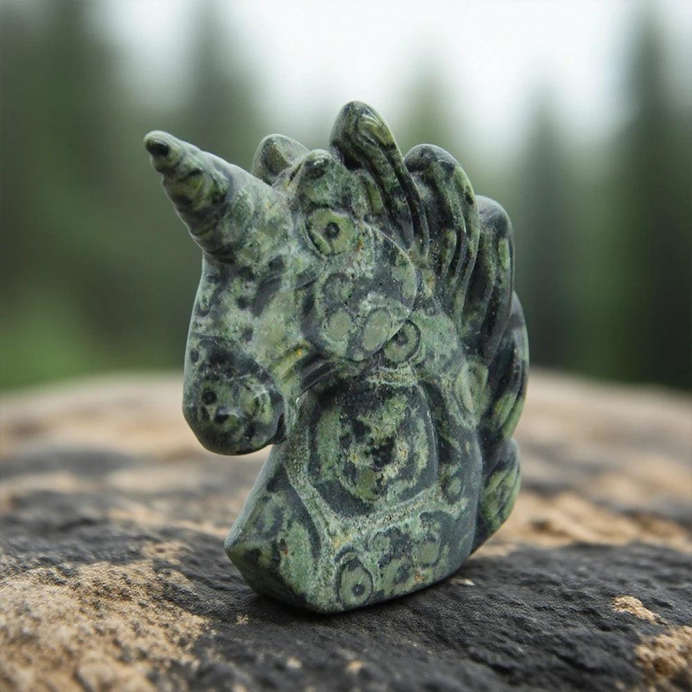 Hand-carved 51mm green crystal unicorn figurine, a mystical stone statue for healing, peace, and chakra energy.
