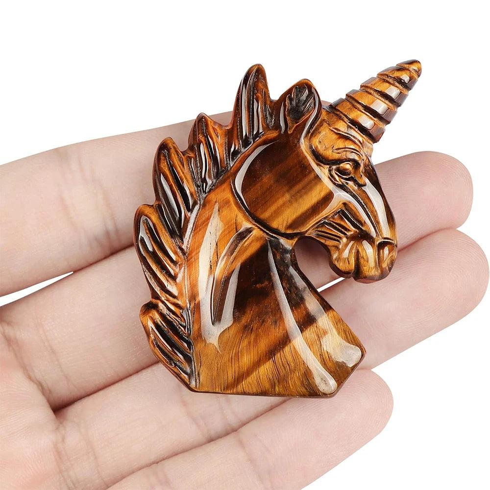 Hand-carved 51mm Tiger's Eye crystal unicorn figurine, a polished stone statue for Solar Plexus Chakra healing and decor.