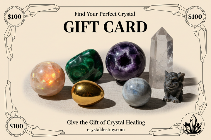 Crystal Destiny $100 gift card featuring a sunstone sphere, malachite, amethyst geode, clear quartz point, and moonstone.