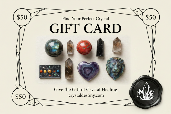 Crystal Destiny Gift Card featuring a collection of healing crystals, including a heart-shaped amethyst and lion carving.