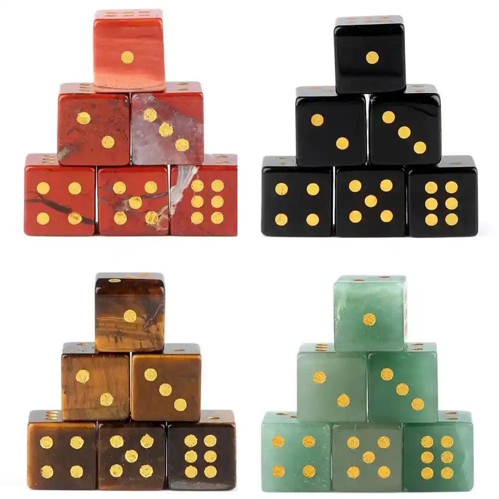 Hand-carved Crystal Dice: Red Jasper, Black Obsidian, Tiger Eye, and Green Aventurine with gold pips.