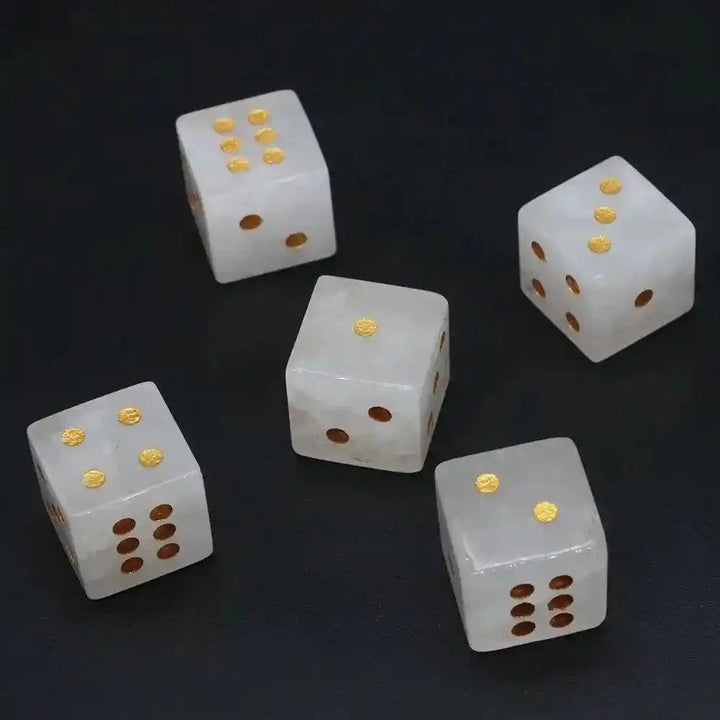 Five 16mm hand-carved Clear Quartz Crystal Dice with gold-painted pips, perfect for gaming or divination.