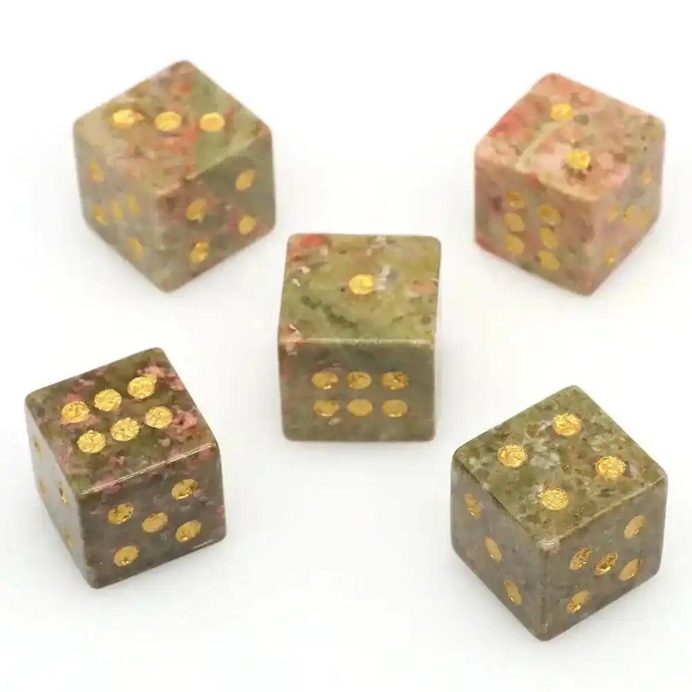 Set of five hand-carved Unakite Crystal Dice, 16mm cubes with gold-painted pips, perfect for gaming or divination.