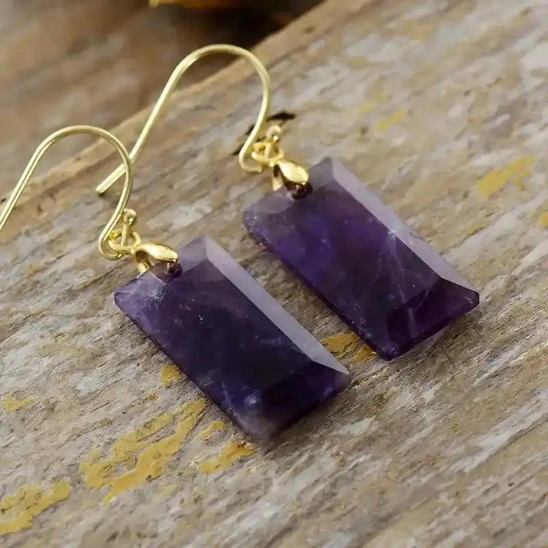 Boho Amethyst Gemstone Drop Earrings with rectangular purple stones and gold-plated hooks, offering clarity and protection.