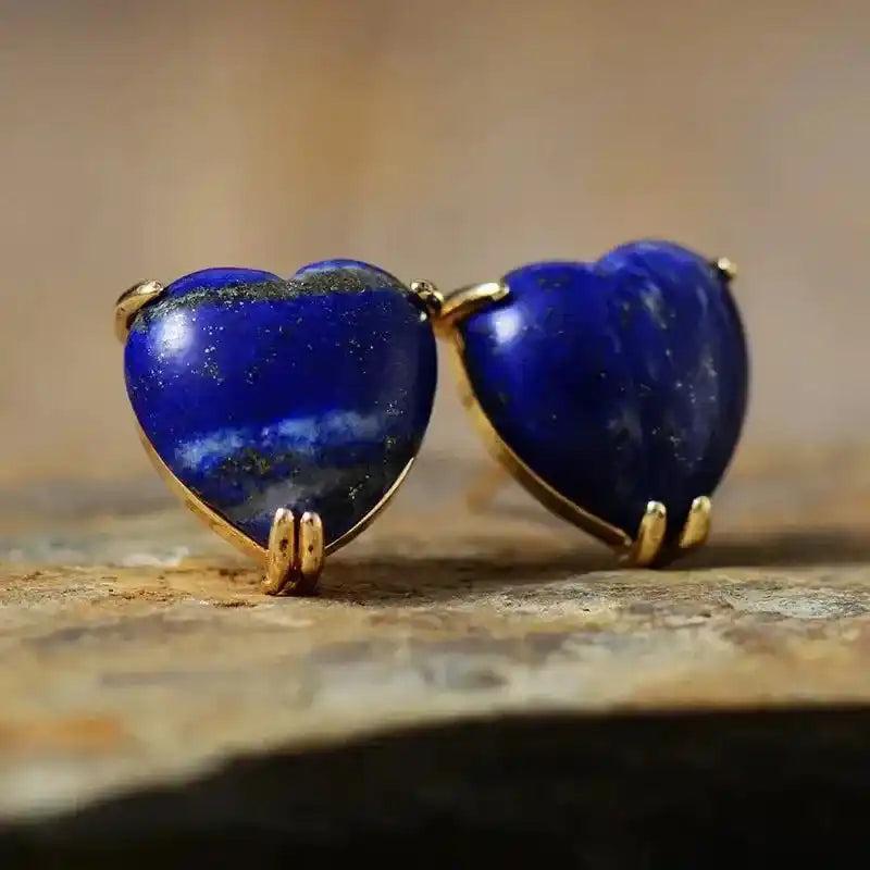 Heart-Shaped Lapis Lazuli Gemstone Stud Earrings, deep blue with gold settings, enhancing wisdom and truth.