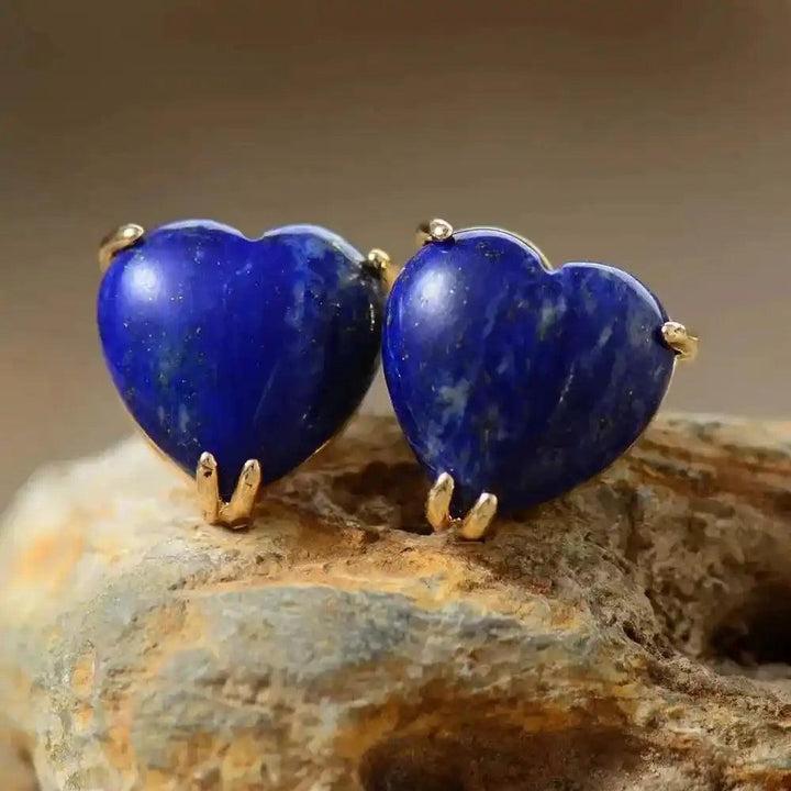 Heart-Shaped Lapis Lazuli Gemstone Stud Earrings, deep blue with gold settings, enhancing wisdom and truth.
