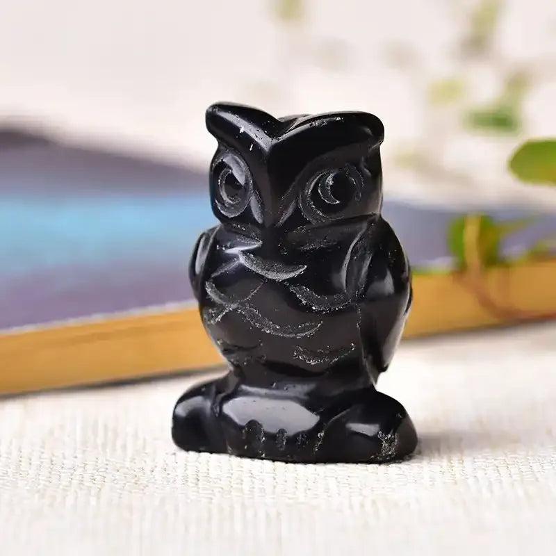 Hand-carved obsidian crystal owl figurine, a polished black stone statue for protection, wisdom, and desk decor.