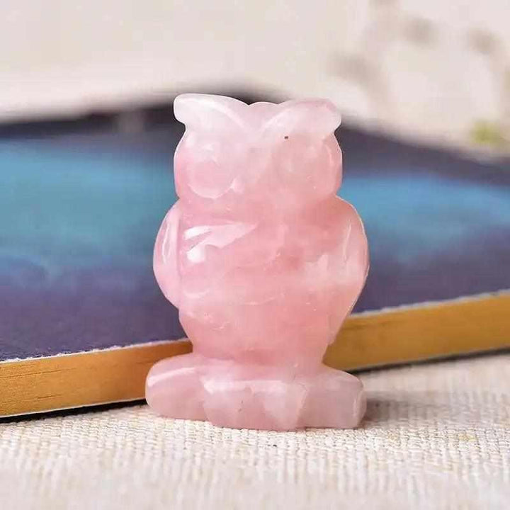 Hand-carved rose quartz owl crystal for love, featuring a polished 40mm design perfect for your desk or altar.