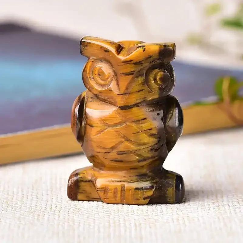 Hand-carved tiger's eye crystal owl figurine, a 40mm polished stone symbol of courage and wisdom for your desk or altar.