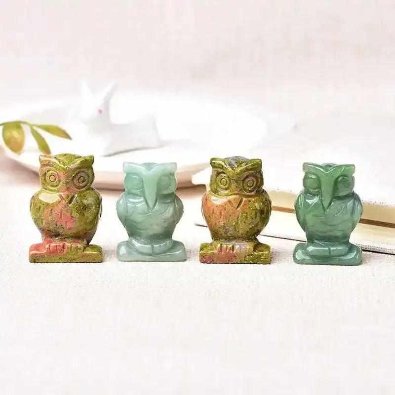 Hand-carved crystal owl figurines in green aventurine and unakite for balance and opportunity, measuring 40mm.